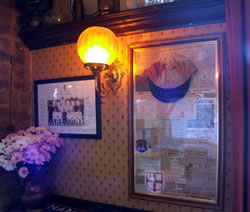 Sporting memorabilia and flowers at The Prince of Wales Pub Weybridge